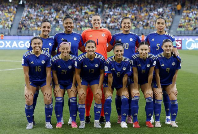 (260301) -- PERTH, March 1, 2026 (Xinhua) -- Starting players of the Philippines line up before the group A opener match between Australia and the Philippines at the 2026 AFC Women's Asian Cup at Perth Stadium in Perth, Australia, March 1, 2026. (Xinhua/Ma Ping)