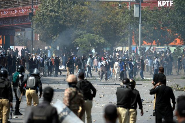 (260301) -- KARACHI, March 1, 2026 (Xinhua) -- Protesters clash with law enforcement personnel near U.S. Consulate in southern Pakistani port city of Karachi on March 1, 2026. At least nine people were killed and more than 12 others injured on Sunday as angry protesters clashed with law enforcement personnel outside the U.S. Consulate in Karachi in the southern Sindh province, rescue officials said. 
   The clashes erupted when demonstrators tried to enter the consulate premises, prompting security forces to respond, according to Rescue 1122 Sindh. (Photo by Imran Ali/Xinhua)