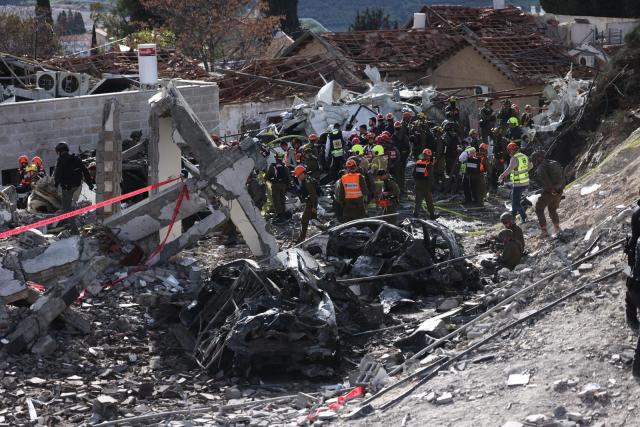(260301) -- JERUSALEM, March 1, 2026 (Xinhua) -- This photo taken on March 1, 2026 shows the scene of a missile strike in Beit Shemesh, west of Jerusalem. Six people were killed and at least 23 were injured on Sunday when an Iranian missile struck a residential area in Beit Shemesh, west of Jerusalem, Israel's Magen David Adom rescue service spokesperson Zaki Heller said. (Photo by Jamal Awad/Xinhua)