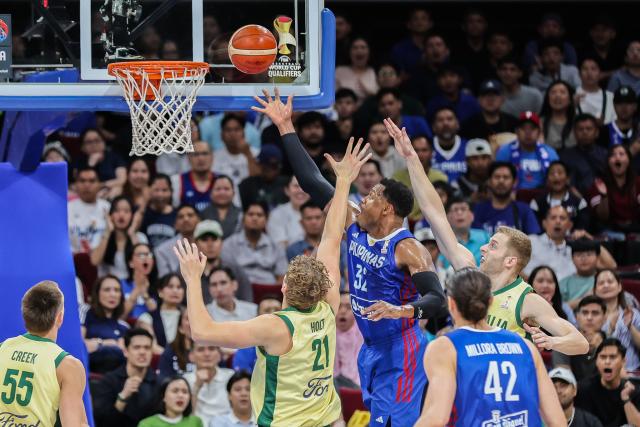 (260301) -- PASAY CITY, March 1, 2026 (Xinhua) -- Justin Brownlee (top) of the Philippines competes during the match between Australia and the Philippines at the FIBA World Cup Asian Qualifiers in Pasay City, the Philippines, on March 1, 2026. (Xinhua/Rouelle Umali)