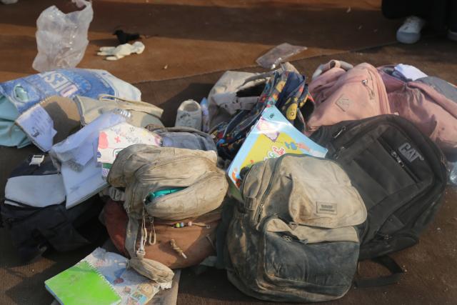 (260301) -- TEHRAN, March 1, 2026 (Xinhua) -- This photo taken on Feb. 28, 2026 shows schoolbags at an attacked girls' elementary school in Minab, Iran's southern province of Hormozgan. The death toll from a joint U.S.-Israeli strike on a girls' elementary school in Iran's southern province of Hormozgan rose to 148, semi-official Tasnim news agency reported on Sunday.
   The attack also left 95 people wounded, local prosecutor Ebrahim Taheri was quoted as saying. (Mehr News Agency/Handout via Xinhua)