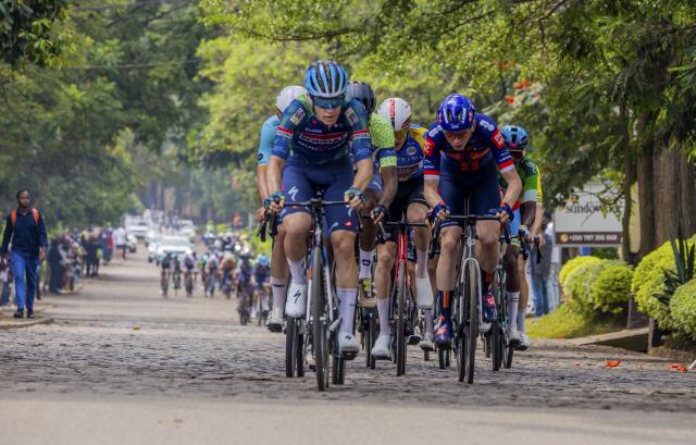 (260302) -- KIGALI, March 2, 2026 (Xinhua) -- Athletes ride during the 8th stage of the Tour du Rwanda 2026 in Kigali, Rwanda, March 1,2026. (Photo by Cyril Ndegeya/Xinhua)