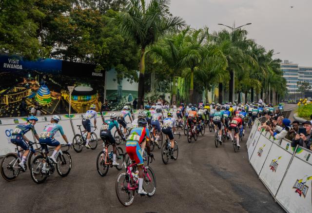 (260302) -- KIGALI, March 2, 2026 (Xinhua) -- Athletes ride during the 8th stage of the Tour du Rwanda 2026 in Kigali, Rwanda, March 1,2026. (Photo by Cyril Ndegeya/Xinhua)