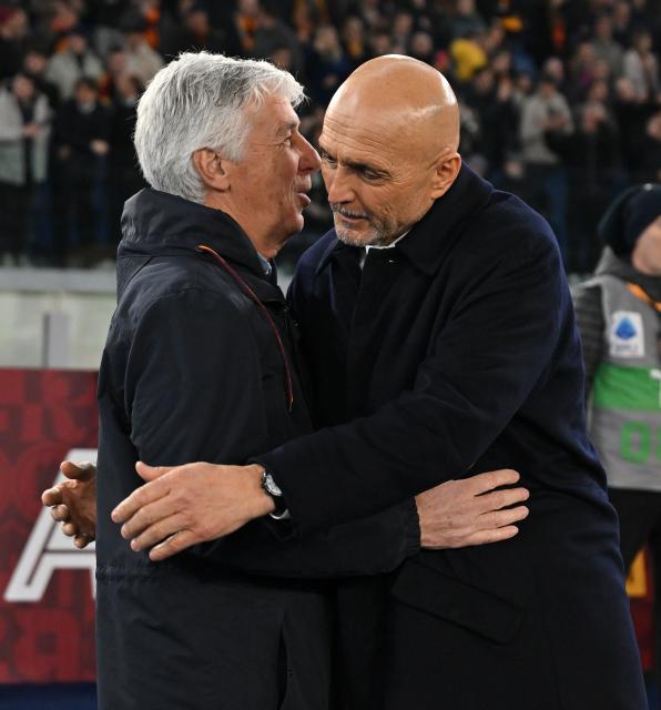 (260302) -- ROME, March 2, 2026 (Xinhua) -- Roma's head coach Giampiero Gasperini (L) hugs with Juventus' head coach Luciano Spalletti during an Italian Serie A football match between Roma and Juventus in Rome, Italy, March 1, 2026. (Photo by Alberto Lingria/Xinhua)
