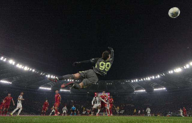 (260302) -- ROME, March 2, 2026 (Xinhua) -- Roma's goalkeeper Mile Svilar (front) fails to save the goal of Juventus' Francisco Coincencao during an Italian Serie A football match between Roma and Juventus in Rome, Italy, March 1, 2026. (Photo by Alberto Lingria/Xinhua)
