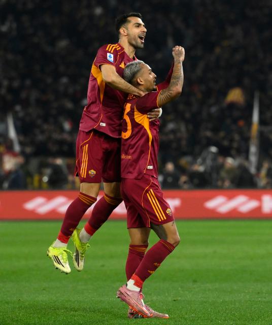 (260302) -- ROME, March 2, 2026 (Xinhua) -- Roma's Wesley Franca (R) celebrates his goal with his teammate Zeki Celik during an Italian Serie A football match between Roma and Juventus in Rome, Italy, March 1, 2026. (Photo by Alberto Lingria/Xinhua)