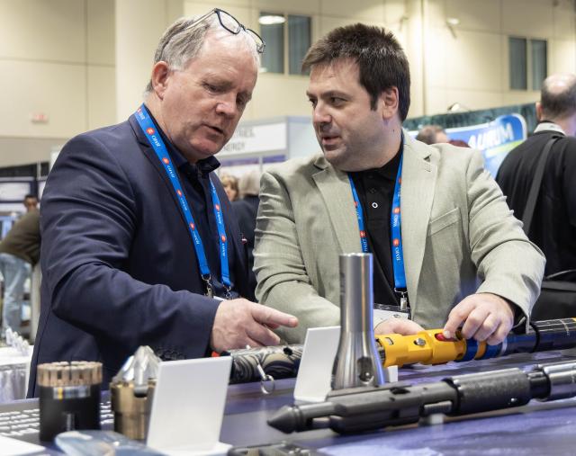 (260302) -- TORONTO, March 2, 2026 (Xinhua) -- Attendees view a set of uphole brakes at the 2026 Prospectors and Developers Association of Canada (PDAC) International Convention in Toronto, Canada, March 1, 2026.
  With more than 27,000 attendees from over 125 countries and regions, the convention kicked off here on Sunday and will last until March 4. (Photo by Zou Zheng/Xinhua)