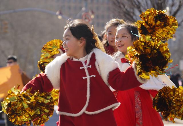 (260302) -- NEW YORK, March 2, 2026 (Xinhua) -- People attend a Chinese New Year parade in New York, the United States, March 1, 2026. A parade was held here to celebrate the Chinese New Year on Sunday. (Xinhua/Zhang Fengguo)