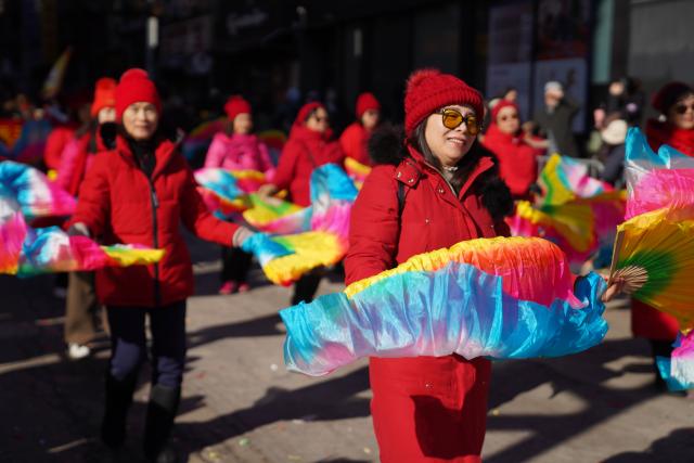 (260302) -- NEW YORK, March 2, 2026 (Xinhua) -- People attend a Chinese New Year parade in New York, the United States, March 1, 2026. A parade was held here to celebrate the Chinese New Year on Sunday. (Xinhua/Zhang Fengguo)