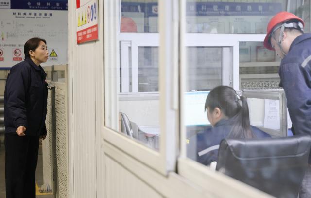 (260302) -- TIANJIN, March 2, 2026 (Xinhua) -- Guo Hongjing (L) checks materials at Tianjin Lizhong Wheel Co., Ltd. in north China's Tianjin, Feb. 25, 2026.
  Guo Hongjing works as the head of a hardware parts team in the warehousing department of Tianjin Lizhong Wheel Co., Ltd. Her daily work involves receiving, dispatching, and checking materials in the warehouse. This seemingly trivial job is far from easy. From screws to motors, across all types and models, she  must keep every item in the warehouse firmly in mind.
  Since 2018, Guo has served as a deputy to the National People's Congress (NPC) for two consecutive terms, during which she is concerned most about her fellow workers. She listens to the voices of front-line workers and collects their opinions and suggestions as much as she can. 
  During her tenure, Guo has visited enterprises for research and surveys, with her focus on the upgrading of manufacturing industry and the transformation of industrial workers. She has also put forward proposals on issues such as rural elderly care and privacy concerns related to courier waybill information leaks.
  At this year's "two sessions," Guo will put emphasis on topics including the green development of industries, the protection of workers' rights, and the implementation of paid leave policies. (Xinhua/Li Ran)