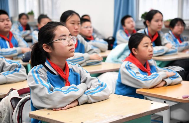 (260302) -- BEIJING, March 2, 2026 (Xinhua) -- Students attend a class at a primary school on the first day of a new semester in Pinggu District of Beijing, capital of China, March 2, 2026. A new semester kicked off for primary and secondary schools in many parts of China on Monday. (Xinhua/Ren Chao)