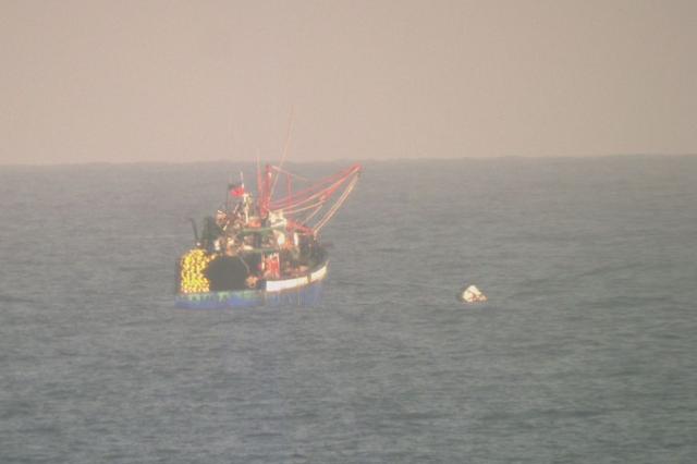 (260302) -- SOUTH CHINA SEA, March 2, 2026 (Xinhua) -- This file photo taken on March 12, 2025 shows a Philippine boat deploying fish aggregating devices (FADs) in waters off China's Huangyan Dao in the South China Sea.
  The Philippine side has in recent days repeatedly directed its coast guard and official vessels to organize fishing boats for intrusions into the territorial waters off China's Huangyan Dao in the South China Sea.
  Under the guise of "escort" and "rights protection," these actions were staged for publicity stunts, infringing upon China's sovereignty and maritime rights and interests.
  TO GO WITH "Explainer: A closer look at Philippine provocations off China's Huangyan Dao" (China Coast Guard/Handout via Xinhua)