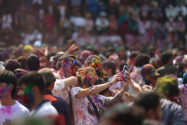 (260302) -- KATHMANDU, March 2, 2026 (Xinhua) -- People smeared with colored powder are pictured during a celebration of the Holi Festival in Kathmandu, Nepal, on March 2, 2026. Holi, the festival of colors, marks the end of winter and the onset of the spring season. (Photo by Sulav Shrestha/Xinhua)