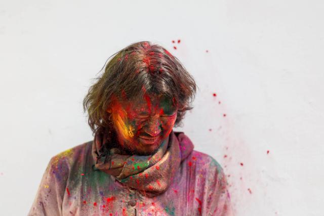 (260302) -- KATHMANDU, March 2, 2026 (Xinhua) -- A man smeared with colored powder is pictured during a celebration of the Holi Festival in Kathmandu, Nepal, on March 2, 2026. Holi, the festival of colors, marks the end of winter and the onset of the spring season. (Photo by Sulav Shrestha/Xinhua)