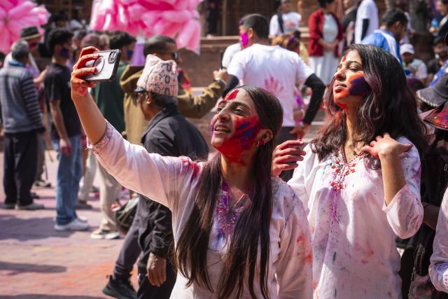 (260302) -- LALITPU, March 2, 2026 (Xinhua) -- People smeared with colored powder are pictured during a celebration of the Holi Festival in Lalitpur, Nepal, on March 2, 2026. Holi, the festival of colors, marks the end of winter and the onset of the spring season. (Photo by Hari Maharjan/Xinhua)
