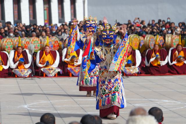 (260302) -- XIAHE, March 2, 2026 (Xinhua) -- This photo taken on March 2, 2026 shows an event of exorcism dance at the Labrang Monastery in Xiahe County, northwest China's Gansu Province. The annual event of exorcism dance to pray for good luck in the new year was held here on Monday. Built in 1709, Labrang Monastery is one of the six great monasteries of the Gelug Sect of Tibetan Buddhism. (Xinhua/Liu Keying)