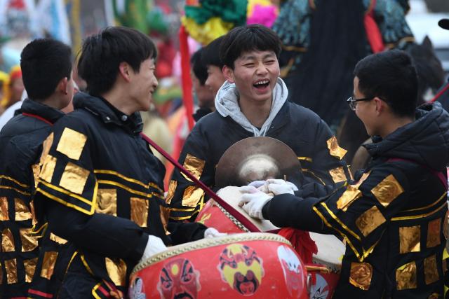 (260302) -- BAOJI, March 2, 2026 (Xinhua) -- Performers attend a Shehuo parade in Huanghuayu Village in Longxian County of Baoji City, northwest China's Shaanxi Province, March 2, 2026.
  Shehuo is a type of traditional Chinese folk art form. Longxian County held a special local Shehuo parade on Monday, which features performers on horseback adorned with simple yet exquisite facial make-up.
  The Shehuo parade is a long-standing and widely popular performance in rural China. It originated in ancient sacrificial ceremonies held to pray for good harvests about 2,000 years ago.
  Over time, as dance and song performances were incorporated, it gradually evolved into a folk custom staged during the Spring Festival and Lantern Festival, believed to ward off bad luck and usher in a fresh start for the new year.
  The Shehuo folk performance in Baoji was added to China's national intangible cultural heritage list in 2006. In recent years, the local Shehuo tradition in Longxian County has continued to thrive through ongoing inheritance and innovation. (Xinhua/Zou Jingyi)