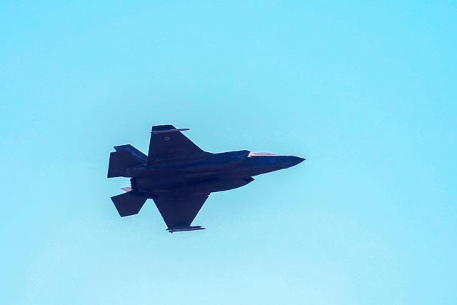 (260302) -- NICOSIA, March 2, 2026 (Xinhua) -- A military fighter aircraft is seen over the RAF (Royal Air Force) base in Akrotiri, Cyprus, on March 2, 2026. The British air base at Akrotiri on the southern coast of Cyprus was hit by a drone early Monday, base authorities and the Cypriot government said. (Photo by George Christophorou/Xinhua)
