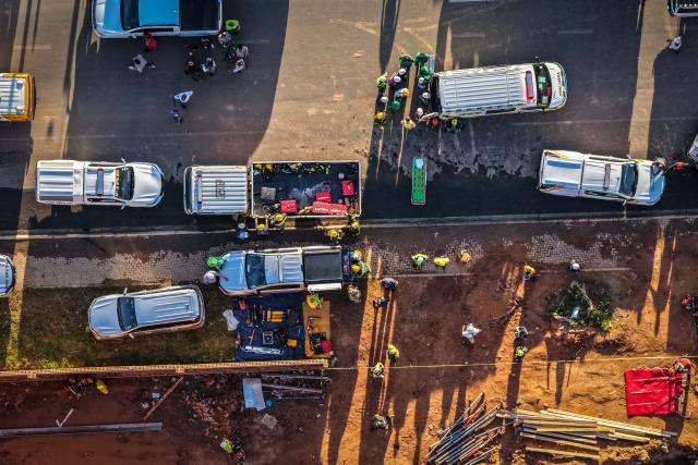 (260302) -- JOHANNESBURG, March 2, 2026 (Xinhua) -- An aerial drone photo taken on March 2, 2026 shows people working at the site of a collapsed building in Johannesburg, South Africa. At least six people were killed and several others remained trapped after a building collapsed on Monday in a southern suburb of Johannesburg, South Africa, local authorities said. (Photo by Shiraaz Mohamed/Xinhua)