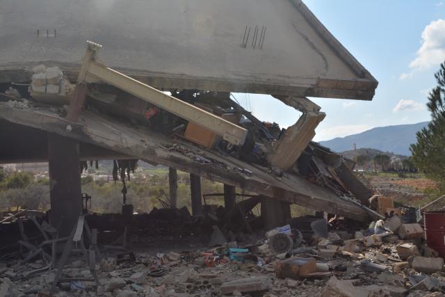 (260302) -- MASHGHARAH, March 2, 2026 (Xinhua) -- Photo taken on March 2, 2026 shows the aftermath of an Israeli airstrike on a branch of the Hezbollah-affiliated Al-Qard Al-Hassan Foundation in Mashgharah, eastern Lebanon. Local media said the strikes targeted branches of Al-Qard Al-Hassan, which Israel describes as a Hezbollah-linked financial institution, in areas including Nabatieh, Tyre, Ain Qana, and Toul. The group provides interest-free loans and banking services to supporters of the Iran-backed movement. (Photo by Taher Abu Hamdan/Xinhua)