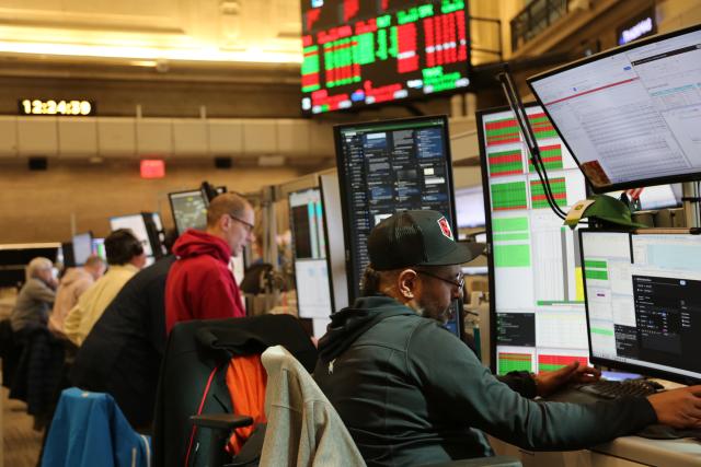 (260302) -- NEW YORK, March 2, 2026 (Xinhua) -- Traders work on the floor of the New York Stock Exchange in New York, the United States, on March 2, 2026. U.S. stocks ended mixed on Monday as investors weighed escalating tensions in the Middle East and their potential impact on global oil supplies.
   The Dow Jones Industrial Average fell 0.15 percent to 48,904.78. The S&P 500 added 0.04 percent to 6,881.62. The Nasdaq Composite Index increased 0.36 percent to 22,748.86. (Xinhua/Liu Yanan)