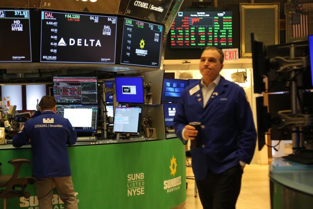 (260302) -- NEW YORK, March 2, 2026 (Xinhua) -- A trader works on the floor of the New York Stock Exchange in New York, the United States, on March 2, 2026. U.S. stocks ended mixed on Monday as investors weighed escalating tensions in the Middle East and their potential impact on global oil supplies.
   The Dow Jones Industrial Average fell 0.15 percent to 48,904.78. The S&P 500 added 0.04 percent to 6,881.62. The Nasdaq Composite Index increased 0.36 percent to 22,748.86. (Xinhua/Liu Yanan)