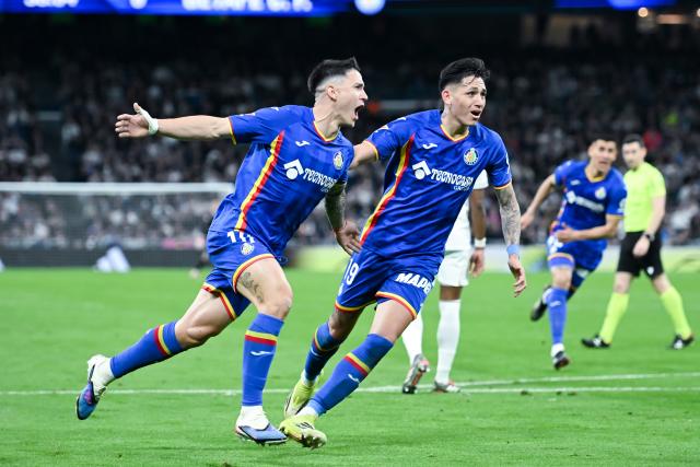 (260303) -- MADRID, March 3, 2026 (Xinhua) -- Getafe's Martin Satriano (L) celebrates scoring during the La Liga football match between Real Madrid and Getafe CF in Madrid, Spain, on March 2, 2026. (Photo by Gustavo Valiente/Xinhua)