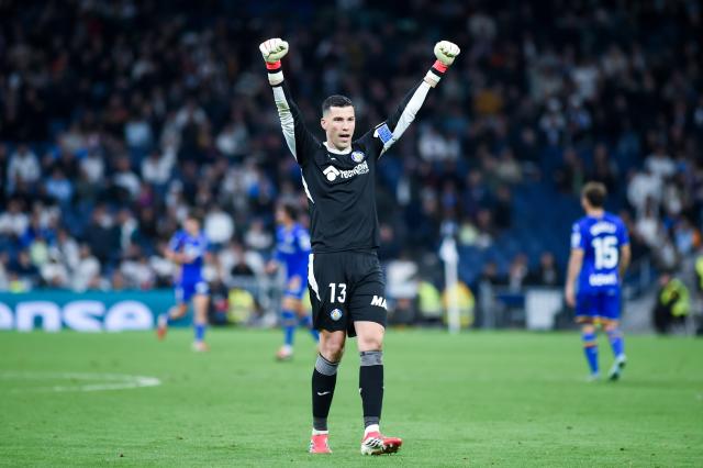 (260303) -- MADRID, March 3, 2026 (Xinhua) -- Getafe's goalkeeper David Soria celebrates after the La Liga football match between Real Madrid and Getafe CF in Madrid, Spain, on March 2, 2026. (Photo by Gustavo Valiente/Xinhua)