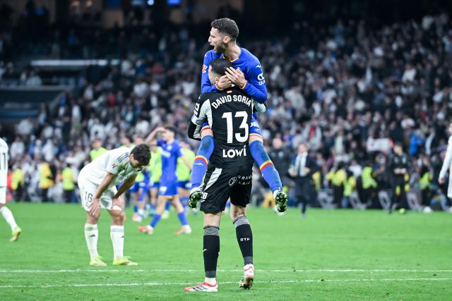 (260303) -- MADRID, March 3, 2026 (Xinhua) -- Players of Getafe celebrate after the La Liga football match between Real Madrid and Getafe CF in Madrid, Spain, on March 2, 2026. (Photo by Gustavo Valiente/Xinhua)