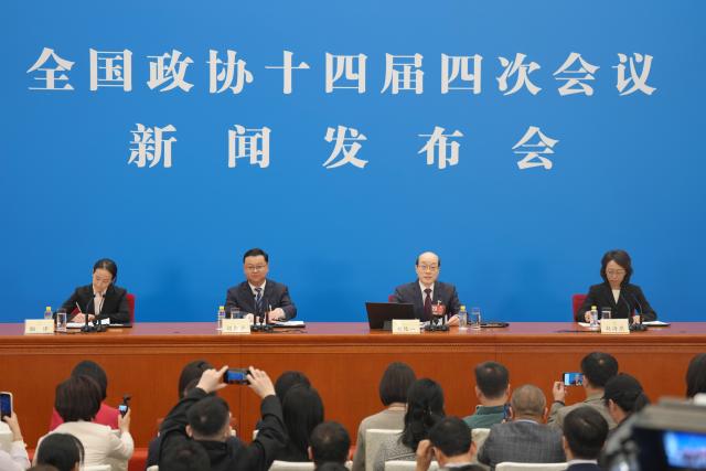(260303) -- BEIJING, March 3, 2026 (Xinhua) -- Liu Jieyi, spokesperson for the fourth session of the 14th Chinese People's Political Consultative Conference (CPPCC) National Committee, attends a press conference at the Great Hall of the People in Beijing, capital of China, March 3, 2026. The CPPCC National Committee, China's top political advisory body, held a press conference on Tuesday, one day before its annual session. (Xinhua/Wang Xi)