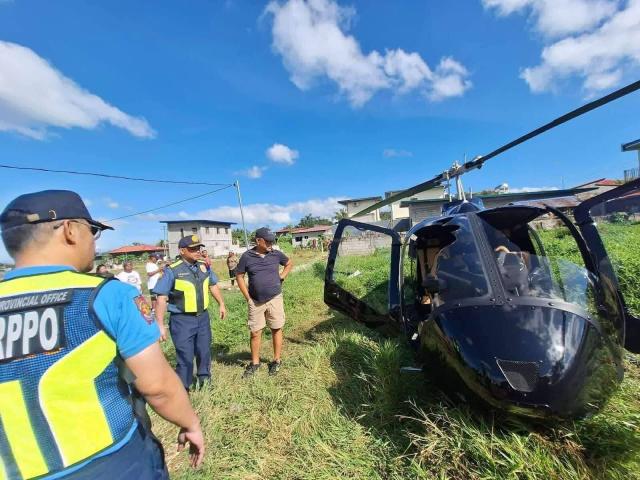 (260303) -- RIZAL, March 3, 2026 (Xinhua) -- Police and rescuers work at the helicopter crash site in Rizal province, the Philippines, March 3, 2026.
  A helicopter crashed Tuesday morning in Rizal province, east of Manila, killing one person and injuring four others, a local official said.
  In a social media post, Pililla town Mayor John Masinsin said the helicopter, carrying five people on board, including two foreign nationals, went down in the town shortly past 7 a.m. local time. (Rizal Police Provincial Office/Handout via Xinhua)