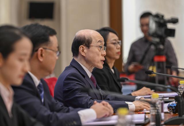 (260303) -- BEIJING, March 3, 2026 (Xinhua) -- Liu Jieyi, spokesperson for the fourth session of the 14th Chinese People's Political Consultative Conference (CPPCC) National Committee, attends a press conference at the Great Hall of the People in Beijing, capital of China, March 3, 2026. The CPPCC National Committee, China's top political advisory body, held a press conference on Tuesday, one day before its annual session. (Xinhua/Cao Yiming)