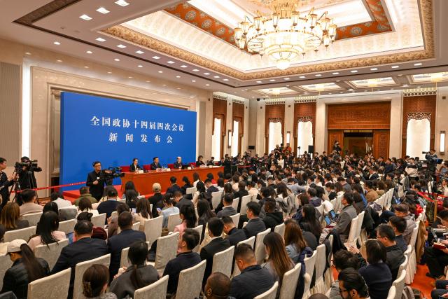 (260303) -- BEIJING, March 3, 2026 (Xinhua) -- Liu Jieyi, spokesperson for the fourth session of the 14th Chinese People's Political Consultative Conference (CPPCC) National Committee, attends a press conference at the Great Hall of the People in Beijing, capital of China, March 3, 2026. The CPPCC National Committee, China's top political advisory body, held a press conference on Tuesday, one day before its annual session. (Xinhua/Cao Yiming)