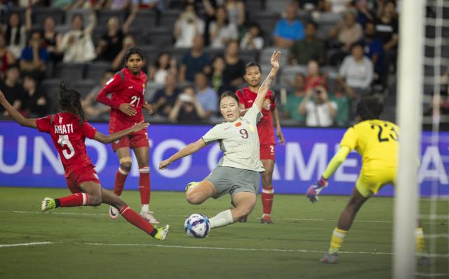 (260303) -- SYDNEY, March 3, 2026 (Xinhua) -- Wurigumula (C) of China shoots during the Group B match of Women's Asian Cup between China and Bangladesh at Western Sydney Stadium in Sydney, Australia, March 3, 2026. (Photo by Hu Jingchen/Xinhua)