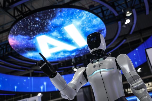(260303) -- BEIJING, March 3, 2026 (Xinhua) -- A robot is displayed at the exhibition area of the 2025 Global Industrial Internet Conference in Shenyang, northeast China's Liaoning Province, Sept. 6, 2025. (Xinhua/Pan Yulong)
