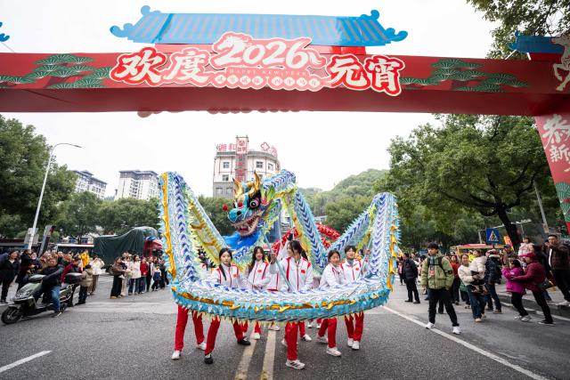 (260303) -- BEIJING, March 3, 2026 (Xinhua) -- Performers stage a dragon dance in celebration of the Lantern Festival in Zhangjiajie, central China's Hunan Province, March 3, 2026. Across China, a variety of vibrant activities were held in celebration of the Lantern Festival, which falls on the fifteenth day of the first month of the Chinese lunar calendar, or March 3 this year. (Xinhua/Chen Sihan)