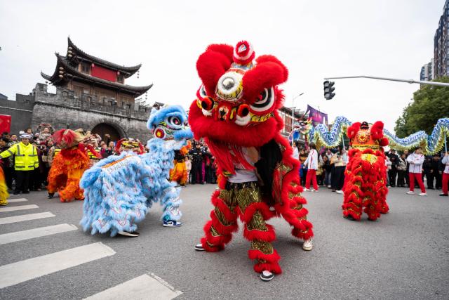 (260303) -- BEIJING, March 3, 2026 (Xinhua) -- Performers stage a lion dance in celebration of the Lantern Festival in Zhangjiajie, central China's Hunan Province, March 3, 2026. Across China, a variety of vibrant activities were held in celebration of the Lantern Festival, which falls on the fifteenth day of the first month of the Chinese lunar calendar, or March 3 this year. (Xinhua/Chen Sihan)