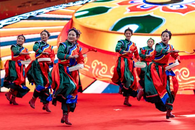 (260303) -- BEIJING, March 3, 2026 (Xinhua) -- Folk dancers perform in celebration of the Lantern Festival in Lhasa, southwest China's Xizang Autonomous Region, March 3, 2026. Across China, a variety of vibrant activities were held in celebration of the Lantern Festival, which falls on the fifteenth day of the first month of the Chinese lunar calendar, or March 3 this year. (Xinhua/Jiang Fan)