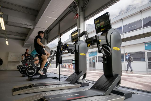 (260303) -- CORTINA D'AMPEZZO, March 3, 2026 (Xinhua) -- Athletes work out in the fitness center at the Paralympic Village of the Milan-Cortina 2026 Paralympic Winter Games in Cortina d'Ampezzo, Italy, March 3, 2026. (Xinhua/Lian Zhen)