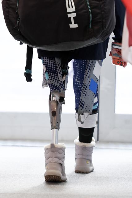 (260303) -- CORTINA D'AMPEZZO, March 3, 2026 (Xinhua) -- An athlete walks in the Paralympic Village of the Milan-Cortina 2026 Paralympic Winter Games in Cortina d'Ampezzo, Italy, March 3, 2026. (Xinhua/Wang Kaiyan)