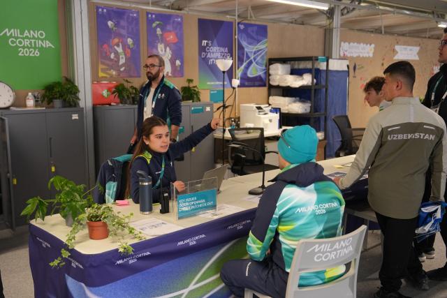 (260303) -- CORTINA D'AMPEZZO, March 3, 2026 (Xinhua) -- Staff work in the resident centre at the Paralympic Village of the Milan-Cortina 2026 Paralympic Winter Games in Cortina d'Ampezzo, Italy, March 3, 2026. (Xinhua/Cai Yang)