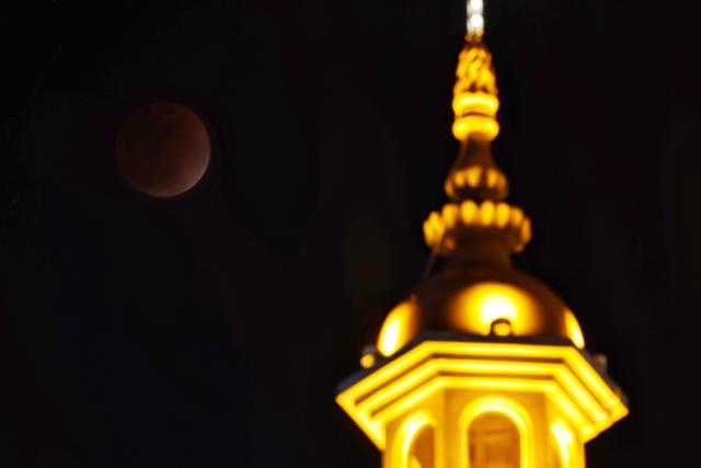 (260303) -- BEIJING, March 3, 2026 (Xinhua) -- The moon is seen during a total lunar eclipse over Tongjiang City, northeast China's Heilongjiang Province, March 3, 2026. Tuesday marked the Lantern Festival, which falls on the 15th day of the first month of the Chinese lunar calendar. This year's festival coincided with a total lunar eclipse. (Photo by Liu Wanping/Xinhua)