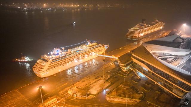 (260303) -- TIANJIN, March 3, 2026 (Xinhua) -- An aerial drone photo taken on March 3, 2026 shows MS Regatta (L) berthing at Tianjin International Cruise Home Port in Tianjin, north China.
  As the first visiting cruise in northern China this year, MS Regatta, a cruise ship operated by Oceania Cruises, arrived at Tianjin International Cruise Home Port from South Korea on Tuesday.
   The nearly 600 passengers aboard MS Regatta, who came from over 20 countries and regions including the United States, Canada and Australia, embarked on a two-day itinerary to experience Tianjin's cultural charm and historical grandeur. (Xinhua/Sun Fanyue)