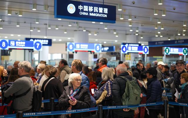 (260303) -- TIANJIN, March 3, 2026 (Xinhua) -- Passengers line up for immigration procedures at Tianjin International Cruise Home Port in Tianjin, north China, March 3, 2026.
  As the first visiting cruise in northern China this year, MS Regatta, a cruise ship operated by Oceania Cruises, arrived at Tianjin International Cruise Home Port from South Korea on Tuesday.
   The nearly 600 passengers aboard MS Regatta, who came from over 20 countries and regions including the United States, Canada and Australia, embarked on a two-day itinerary to experience Tianjin's cultural charm and historical grandeur. (Xinhua/Sun Fanyue)