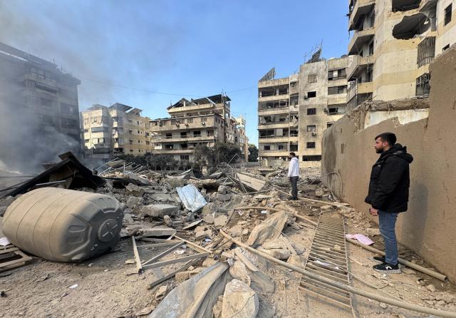 (260303) -- BEIRUT, March 3, 2026 (Xinhua) -- People check the rubble after Israel's overnight bombing of Beirut's southern suburbs, March 3, 2026. Two members of the Islamic Health Authority were killed on Tuesday in an Israeli airstrike on the southern Lebanese town of Siddiqine, the state-run National News Agency (NNA) reported.
   The escalation extended beyond the border region to Beirut's southern suburbs, where Israeli warplanes carried out a new series of intense airstrikes without prior warning, causing significant damage to targeted buildings, NNA said. (Photo by Bilal Jawich/Xinhua)