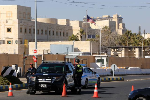 (260303) -- AMMAN, March 3, 2026 (Xinhua) -- Jordanian policemen block the area and roads surrounding the U.S. embassy in Amman, Jordan on March 3, 2026. All personnel at the U.S. Embassy in Amman have temporarily departed the embassy compound due to a security threat, the embassy said in a statement on Monday. (Photo by Mohammad Abu Ghosh/Xinhua)