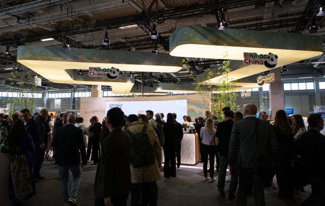 (260303) -- BERLIN, March 3, 2026 (Xinhua) -- People visit the China Pavilion at the ITB Berlin travel trade show in Berlin, Germany on March 3, 2026. This year's ITB Berlin travel trade show kicked off here on Tuesday and will last until March 5. First held in 1966, the event celebrates its 60th anniversary this year. (Xinhua/Zhang Haofu)