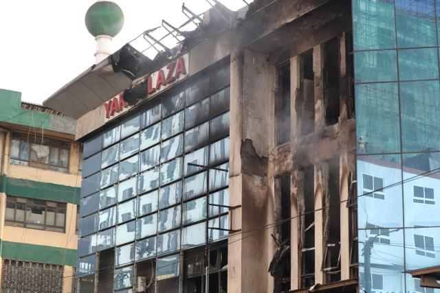 (260303) -- NAIROBI, March 3, 2026 (Xinhua) -- Photo taken on March 3, 2026 shows the scene of a fire at Yare Plaza in Nairobi, capital of Kenya. A fire broke out on Tuesday at Yare Plaza, a place which mainly houses clothing vendors. (Photo by Henry Naminde/Xinhua)