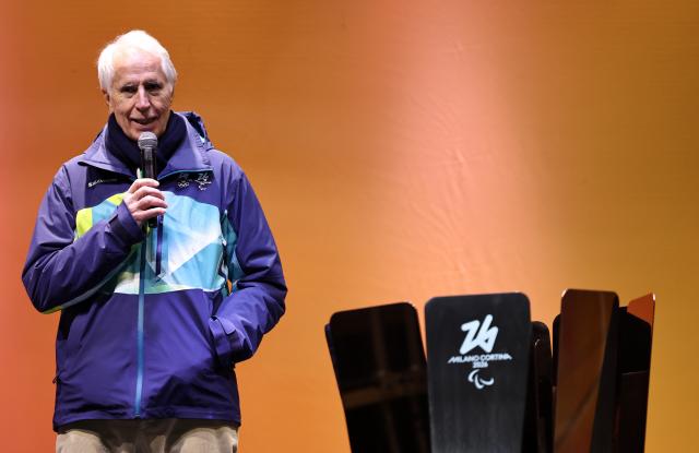 (260304) -- CORTINA D'AMPEZZO, March 4, 2026 (Xinhua) -- Giovanni Malago, president of the Milan-Cortina 2026 organizing committee, delivers a speech during the Milan-Cortina 2026 Paralympic Winter Games Torch Relay and Flame Unifying Ceremony in Cortina D'Ampezzo, Italy, March 3, 2026. (Xinhua/Wang Kaiyan)