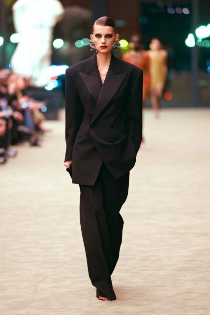 (260304) -- PARIS, March 4, 2026 (Xinhua) -- A model presents a creation from the ready-to-wear Fall/Winter 2026-2027 collections by Saint Laurent during the Paris Fashion Week in Paris, France, on March 3, 2026. (MeetEurope/Handout via Xinhua)